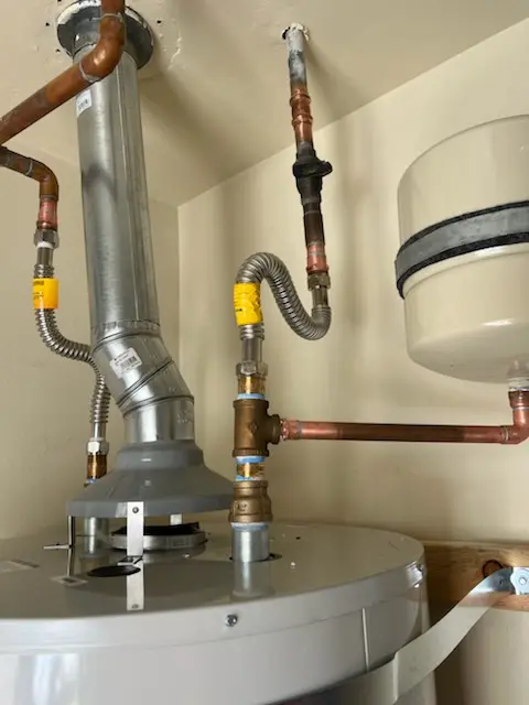 Water heater installation and plumbing repair in Belmont Park